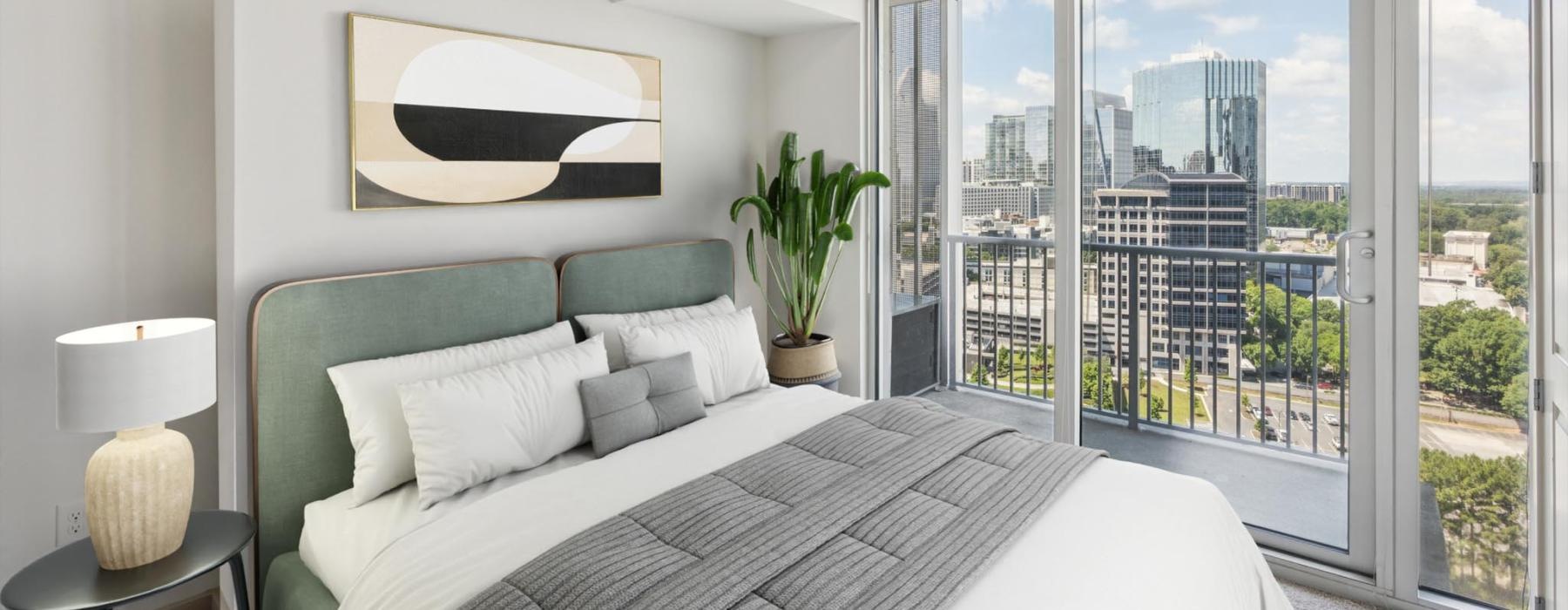 a bedroom with a large window