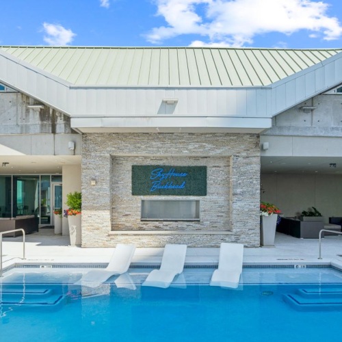 a swimming pool outside of a building