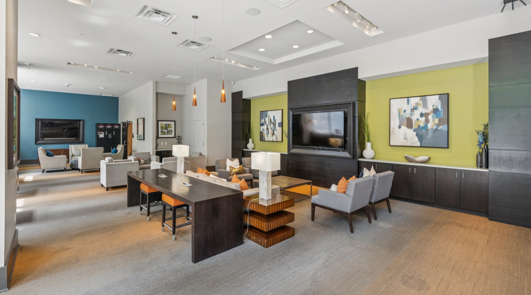 a spacious clubroom with lounge seating